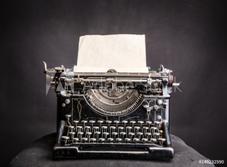 Picture of Vintage black typewrite with inserted paper sheet